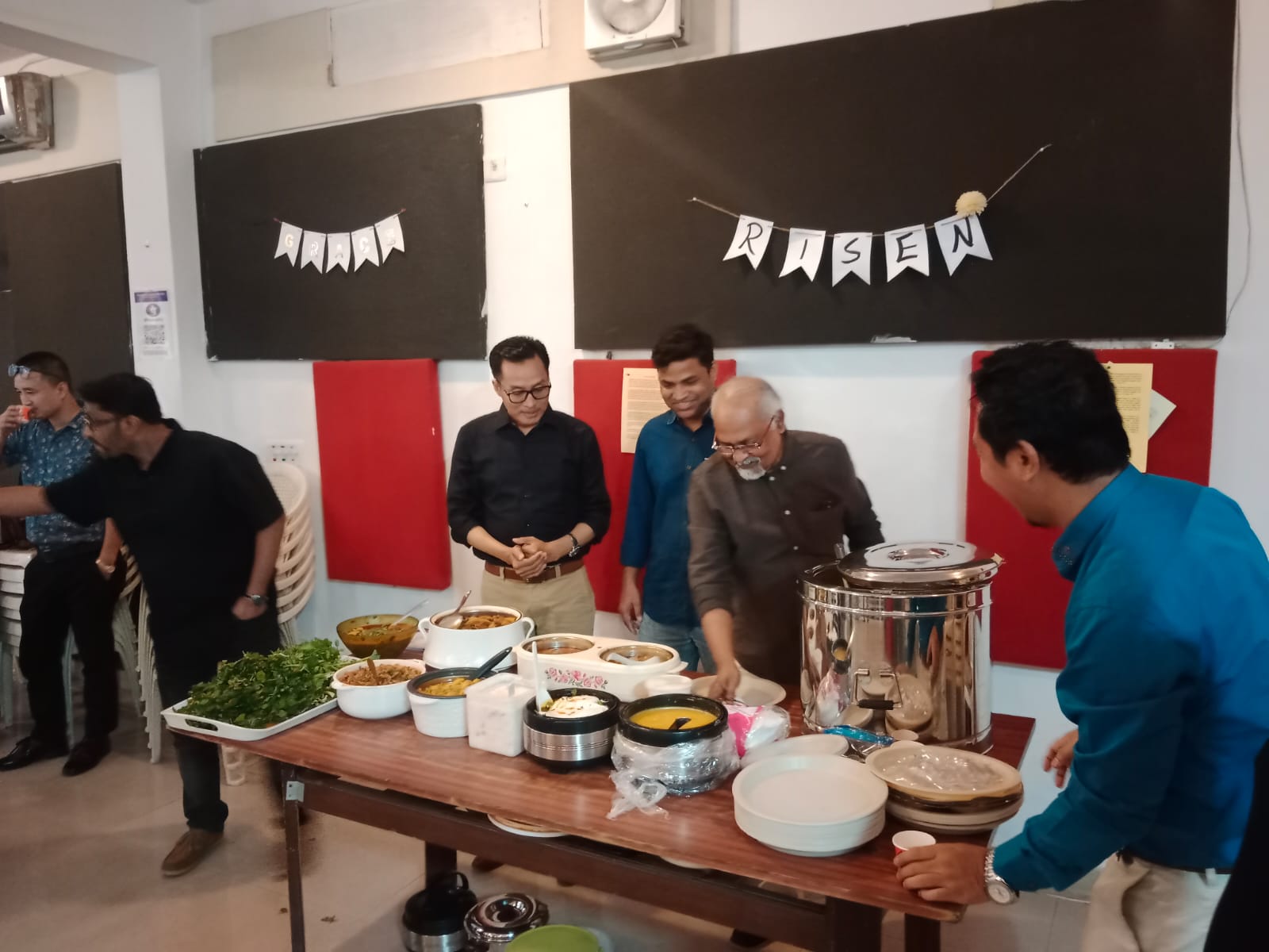DCC men serving during the Fellowship Lunch 